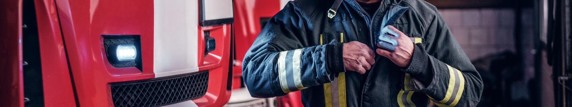 Fireman wearing protective uniform