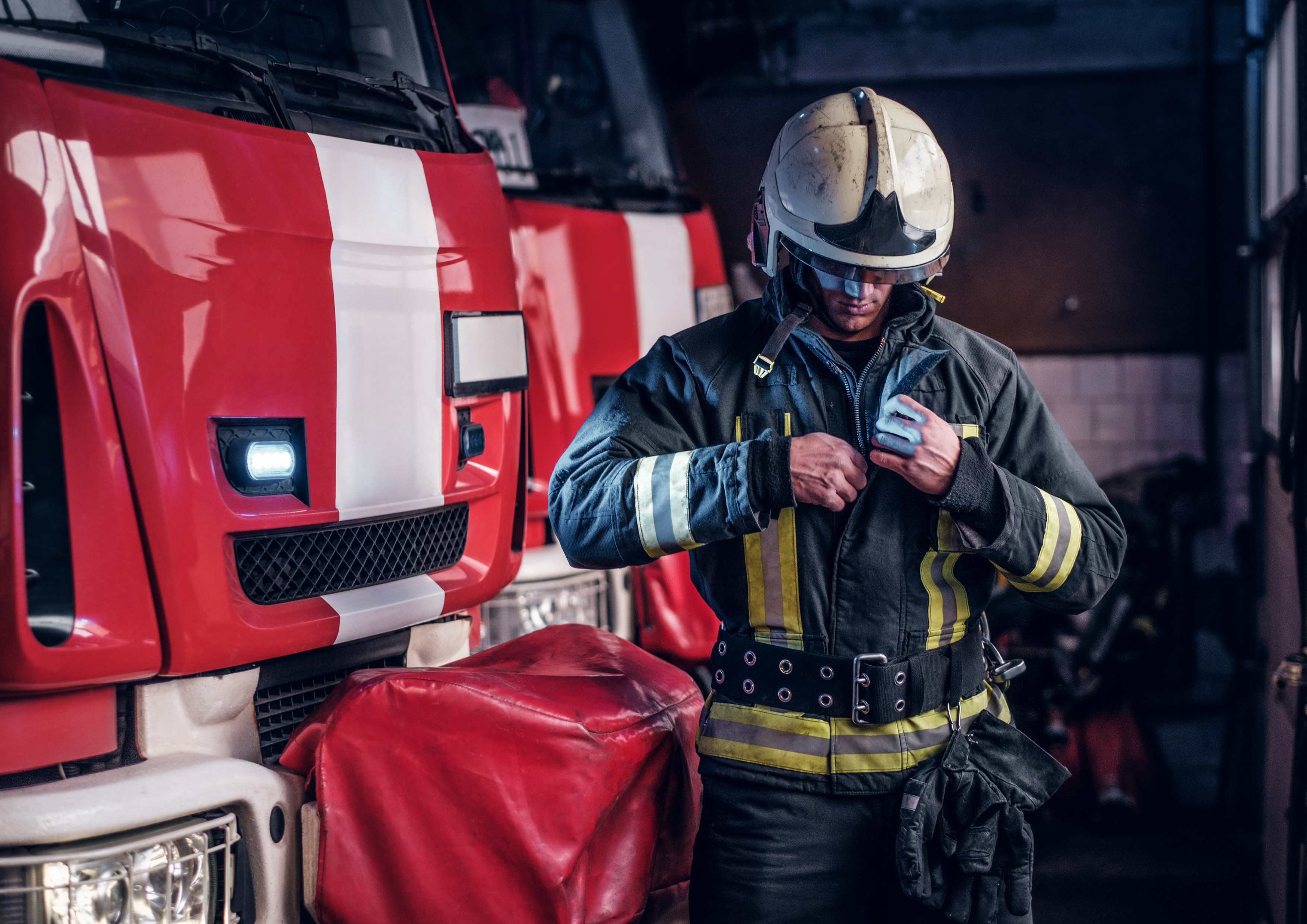 Fireman wearing protective uniform